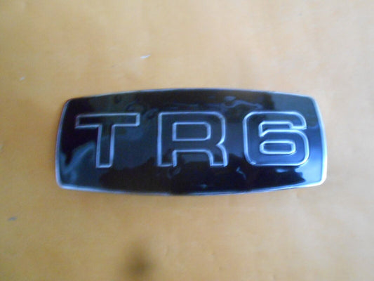 TRIUMPH TR6 (1968-73) NEW METAL ENAMEL FRONT GRILL BADGE - OE PART NO 625662