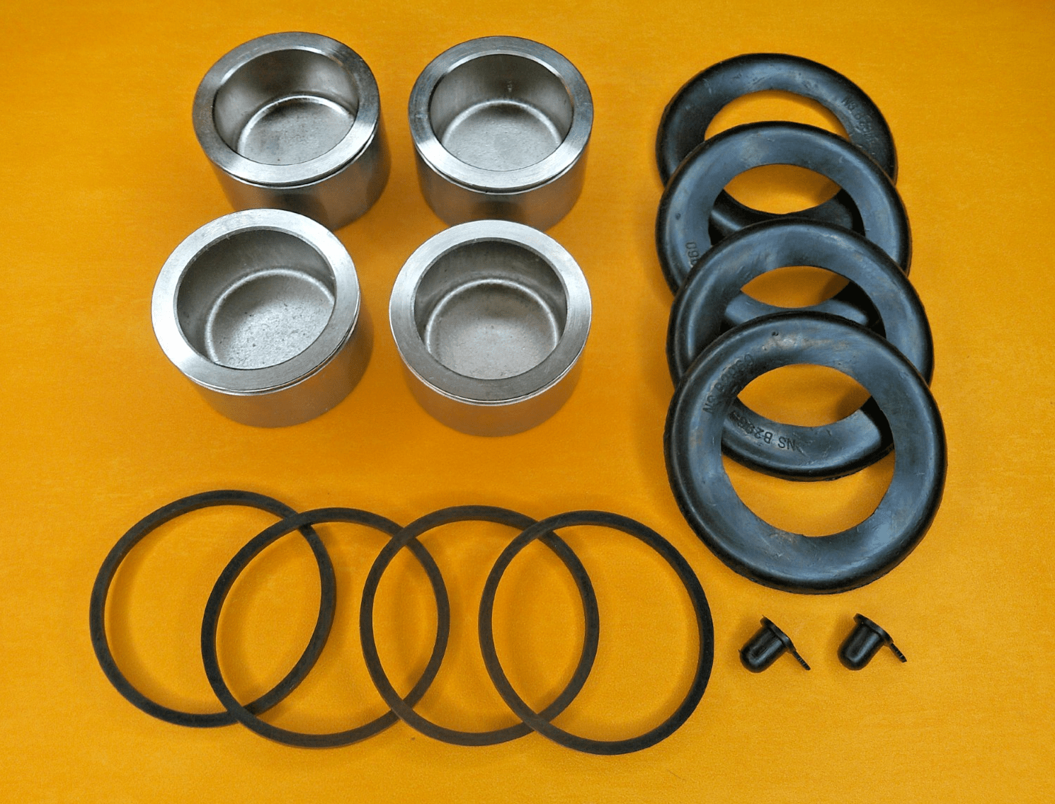 FORD CONSUL Mk2 (1960-62) BRAKE CALIPER PISTONS & REPAIR KIT -axle set - Vroom Classics