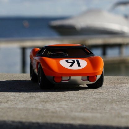 PLAYFOREVER KEN GIBSON ORANGE - Vroom Classics