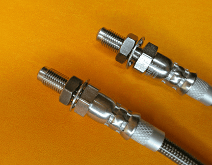 TRIUMPH GT6 (1970 - 1974) STAINLESS STEEL FRONT BRAKE HOSES PAIR - Vroom Classics