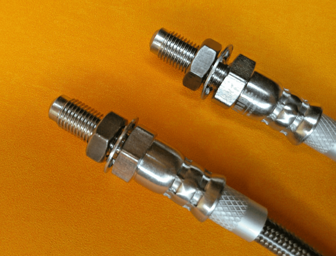 TRIUMPH GT6 (oct/1972 - 74) REAR STAINLESS STEEL BRAKE HOSES PAIR - Vroom Classics