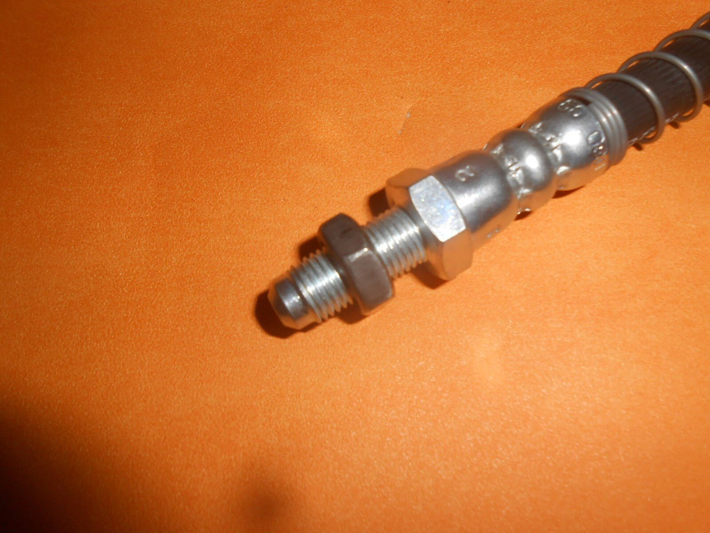 TRIUMPH STAG (1970 - 77) REAR RIGHT ARMOURED BRAKE HOSE +locking nut - Vroom Classics